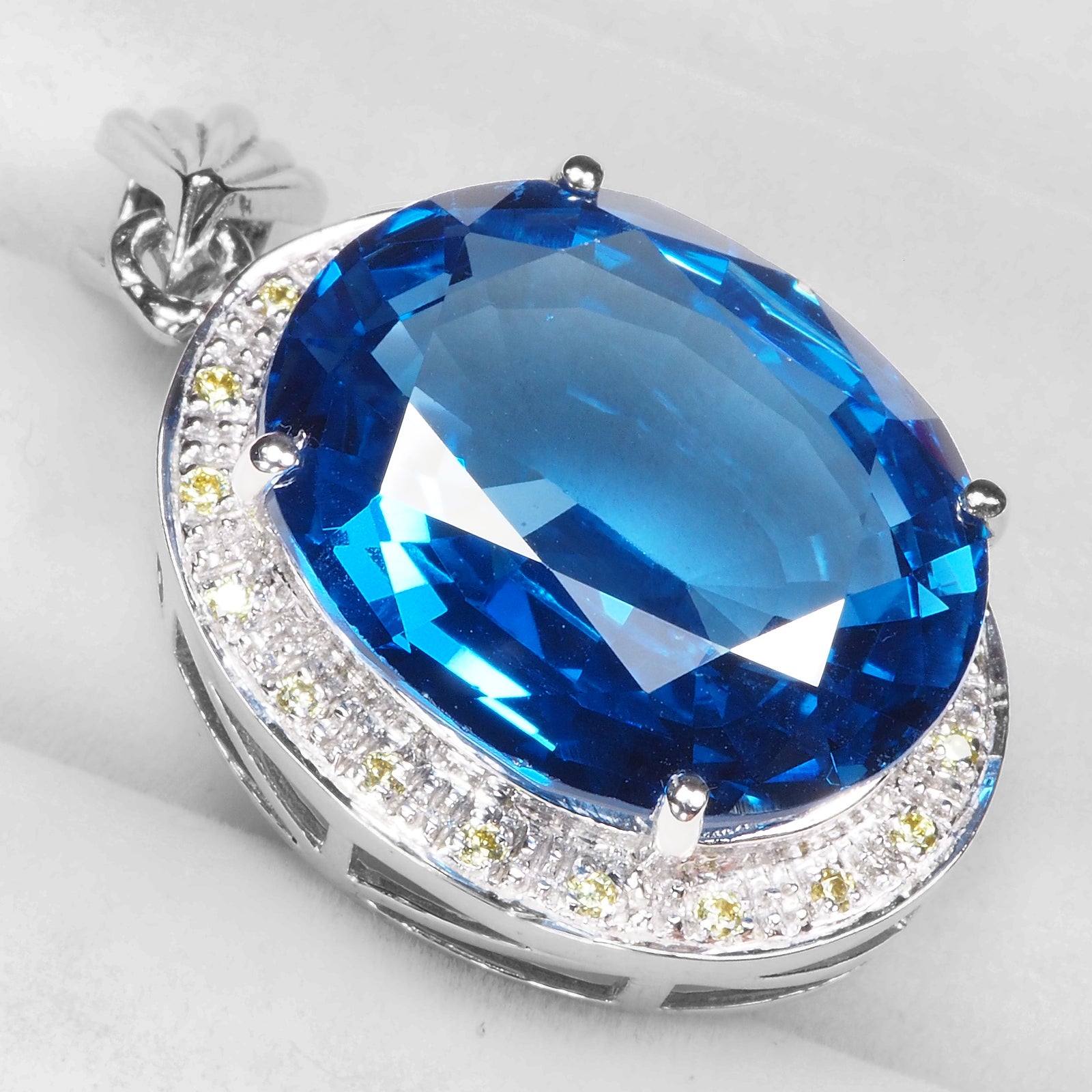 Blue Topaz Sterling Silver Halo Pendants