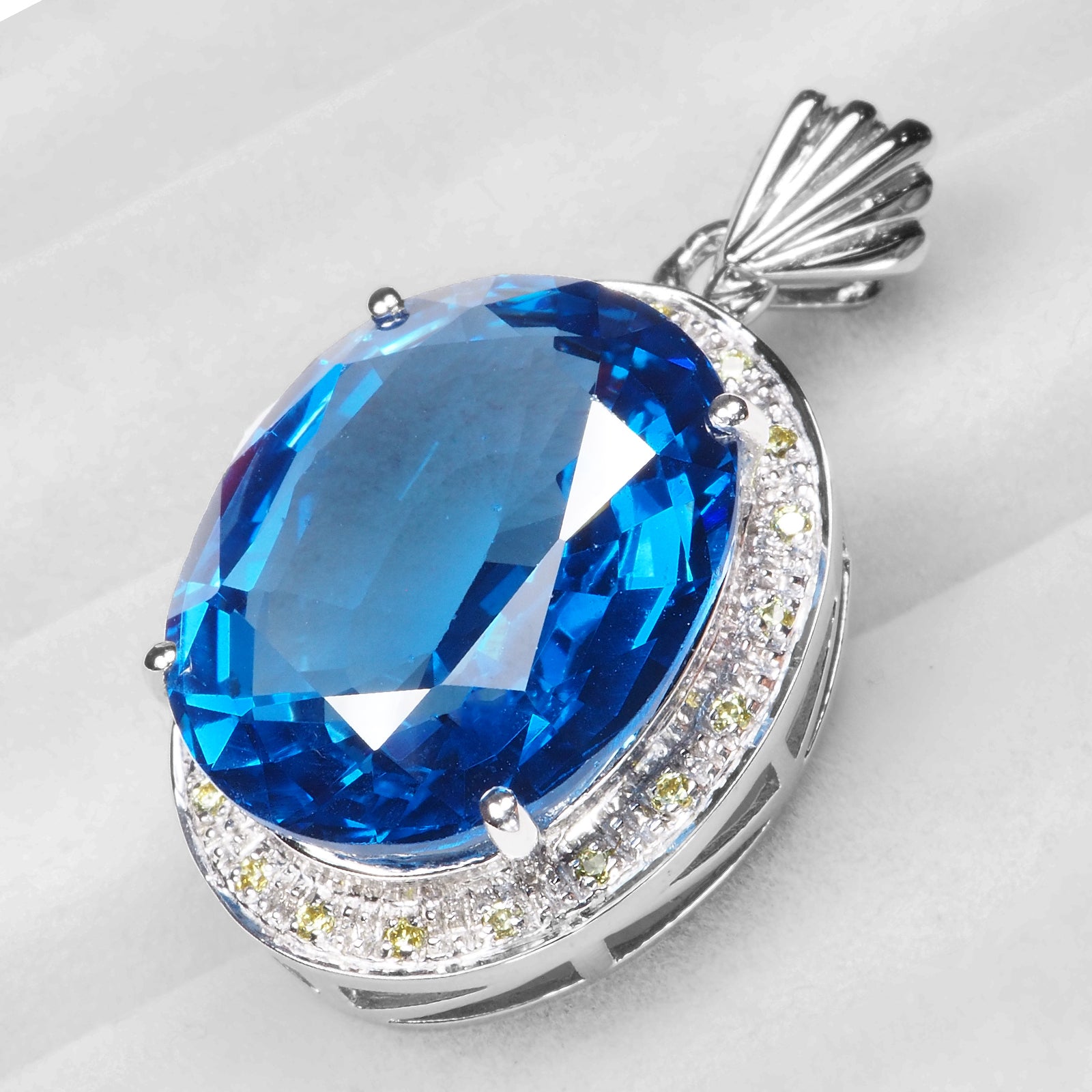 Blue Topaz Sterling Silver Halo Pendants