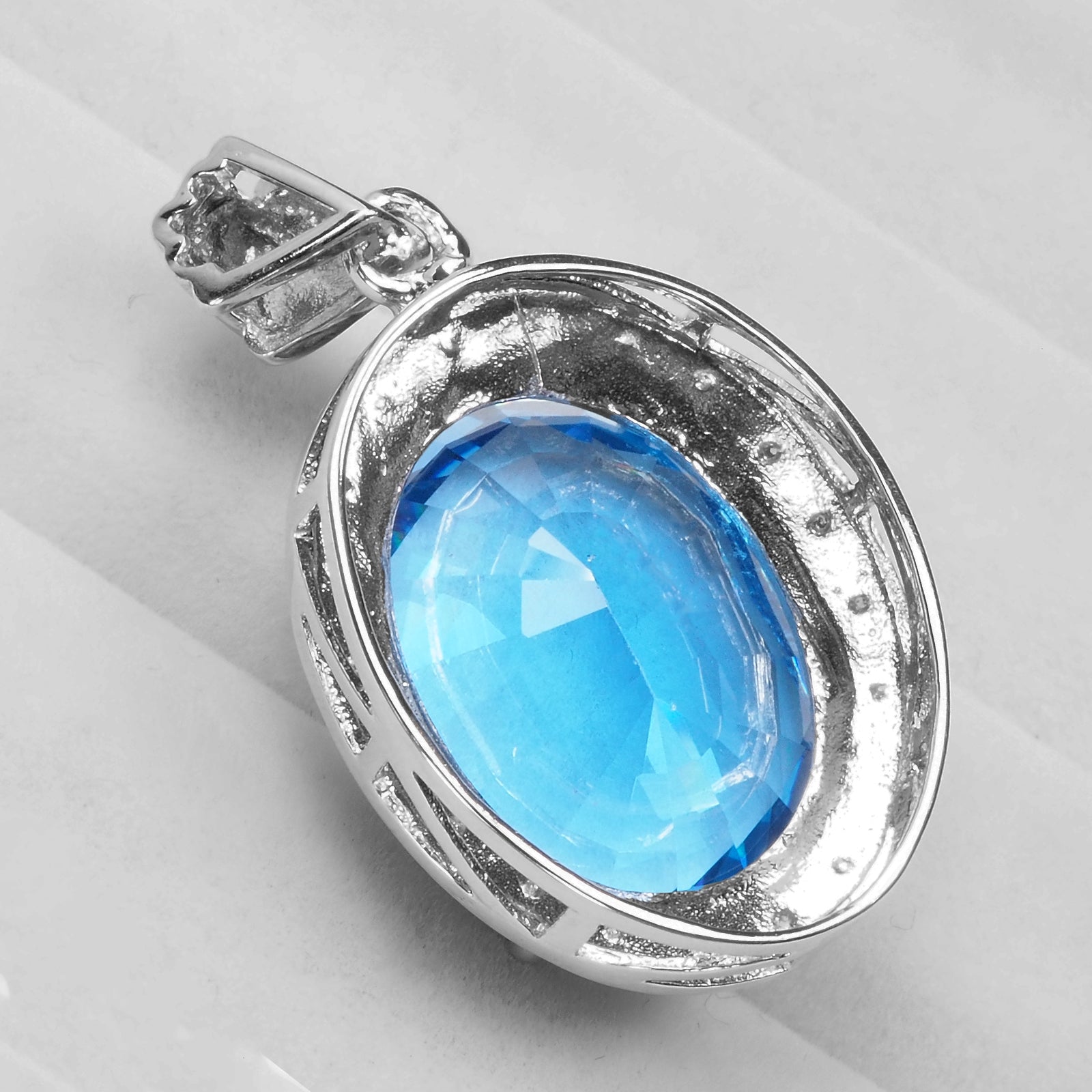 Blue Topaz Sterling Silver Halo Pendants