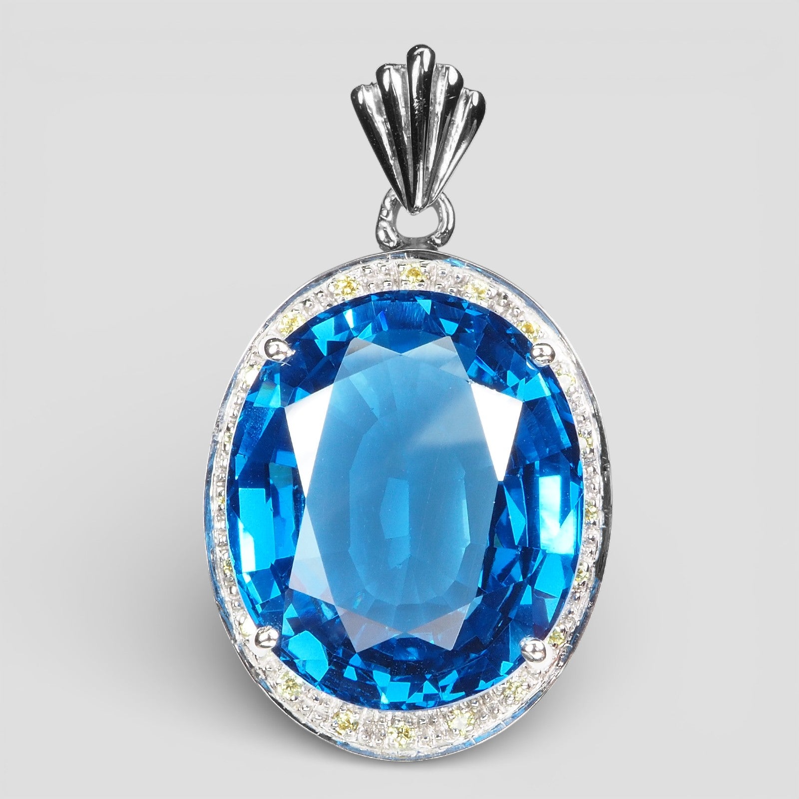 Blue Topaz Sterling Silver Halo Pendants